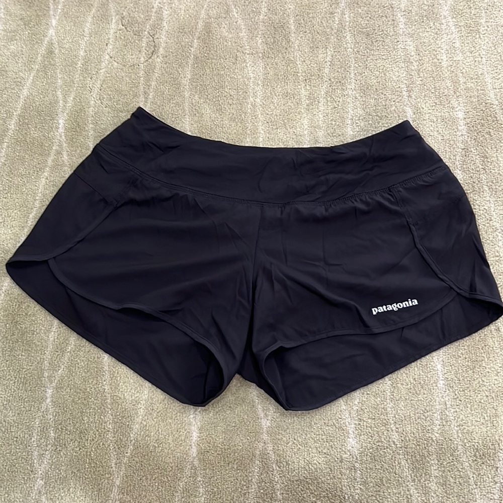 Black Patagonia 2 1/2 inch running shorts.